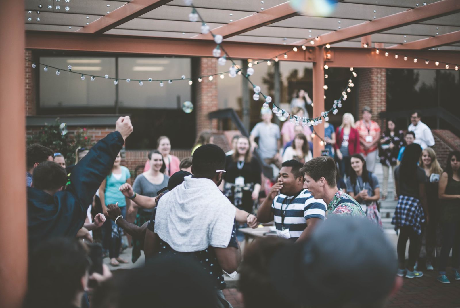 People participating together at an evening event