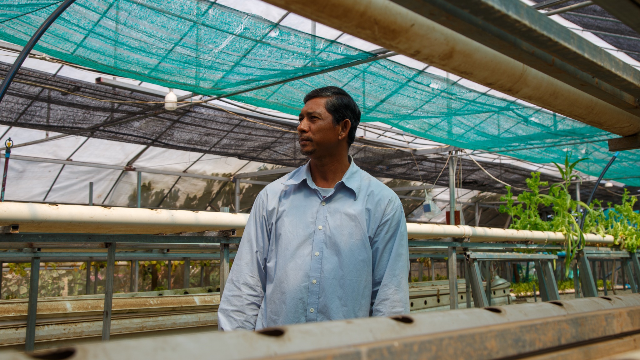 A Cambodian farmer documented for Enabling Qapital
